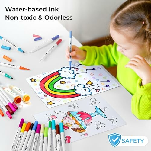 Child coloring a rainbow and cupcake with markers.