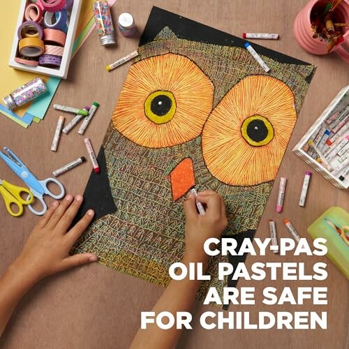 Child drawing an owl with Cray-Pas oil pastels.