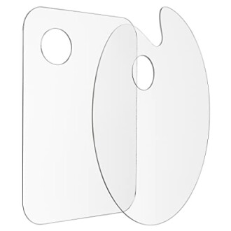Two transparent acrylic paint palettes, one rectangular and one oval, each with a thumb hole.