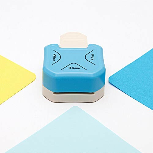 Corner rounder paper cutter with blue and yellow paper.
