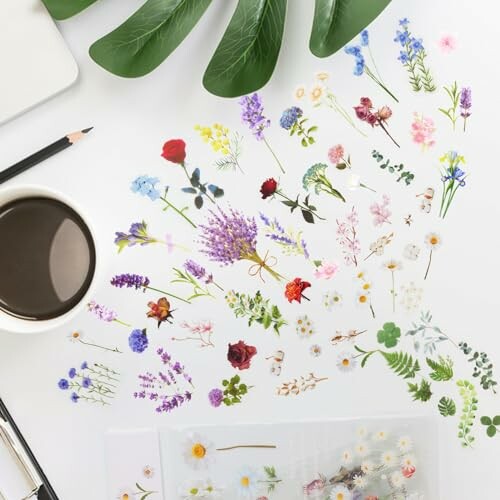 Assorted small flower decals and a cup of coffee on a desk