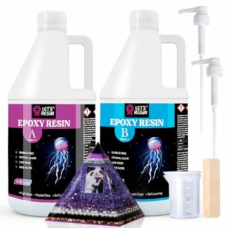 Epoxy resin kit with bottles, pyramid mold, measuring cup, and stir sticks.
