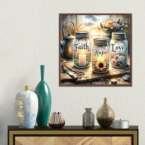 Wall art featuring mason jars labeled Faith, Hope, Love with flowers and candles.