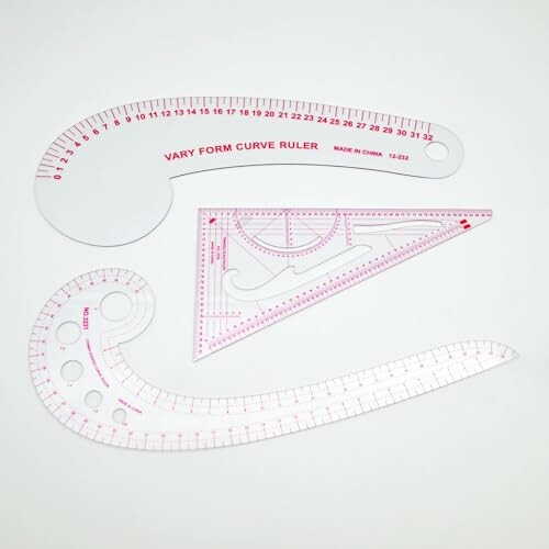 Set of fashion design rulers on a white background.
