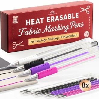 Set of heat erasable fabric marking pens with multiple colors.