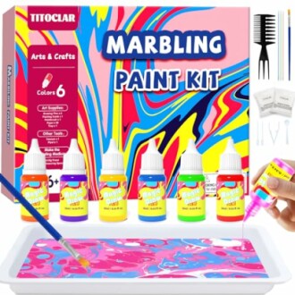 Colorful marbling paint kit with tools and paint bottles.