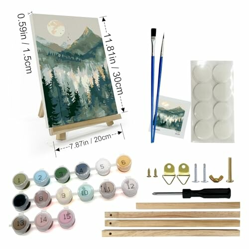 Mini painting kit with canvas, brushes, paints, and easel.