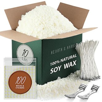 Natural soy wax candle making kit with soy wax, wicks, stickers, and wick holders.