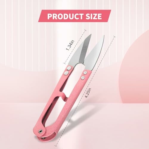 Small pink scissors with dimensions shown.
