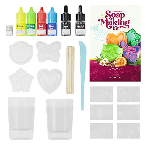 Soap making kit with molds, colors, and instructions.
