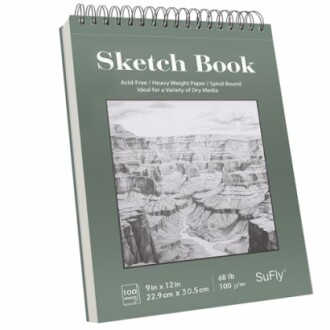 Spiral-bound sketchbook with a Grand Canyon drawing on the cover.