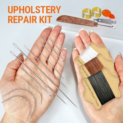 Upholstery repair kit with needles and threads.