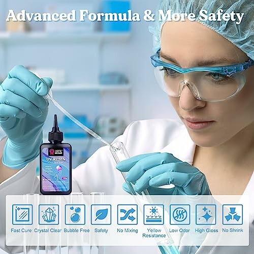 Scientist testing UV resin in a lab with safety gear.